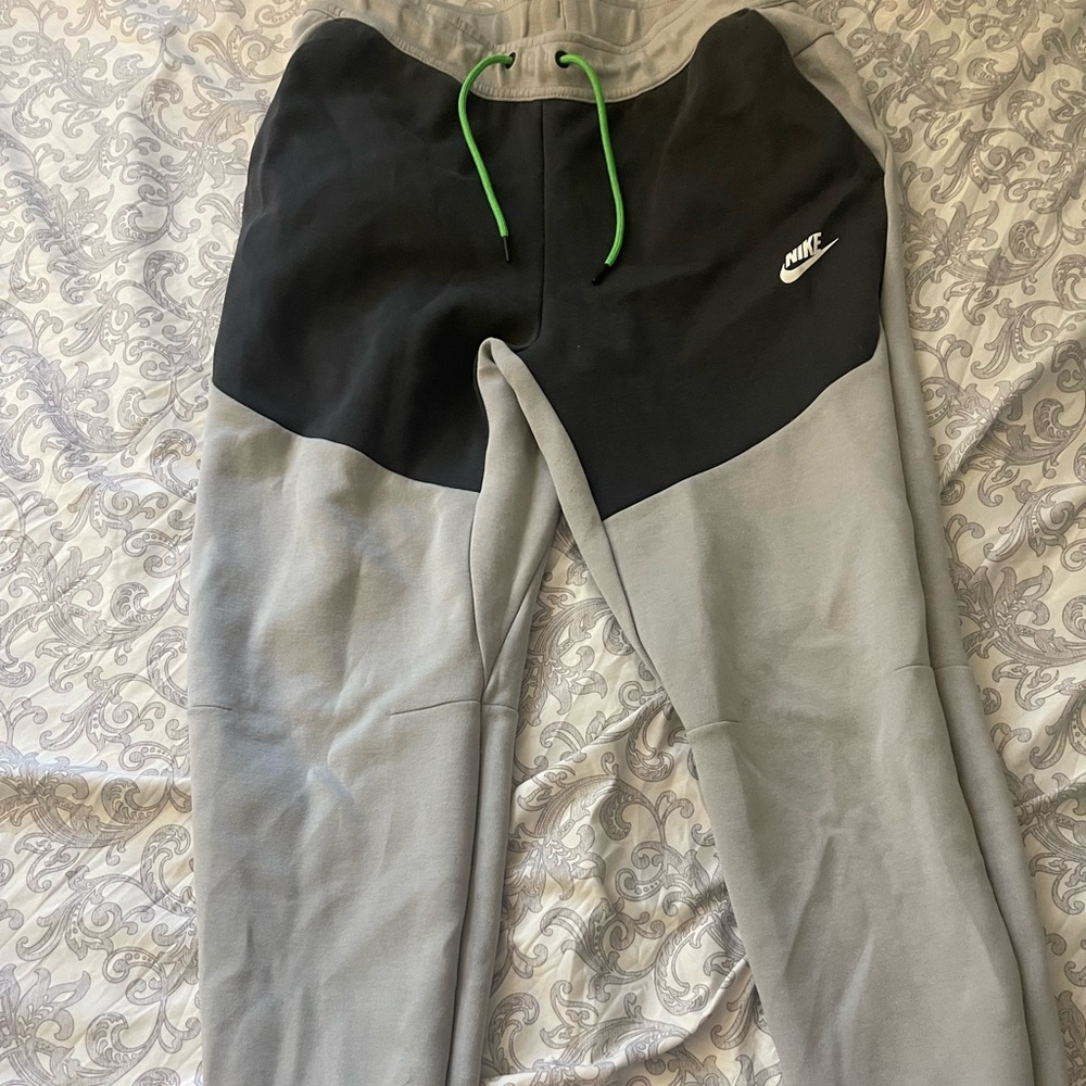 Nike tech with Black and Gray Sweatpants with Green Accents